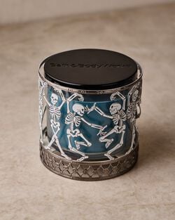 Glow-in-the-Dark Dancing Skeleton 3-Wick Candle Holder